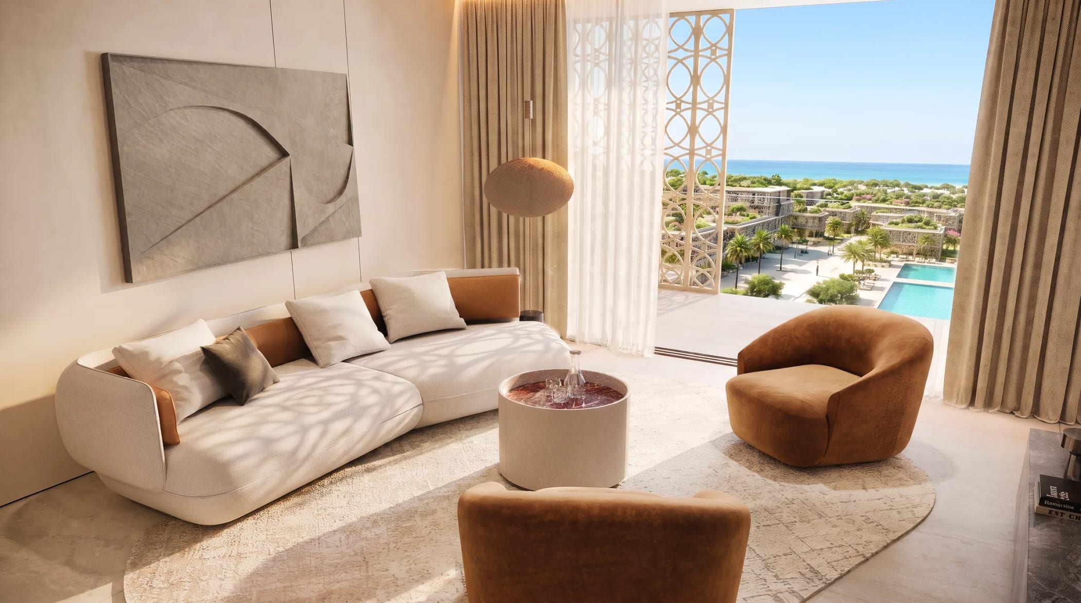 A fully furnished living room looking out over the water